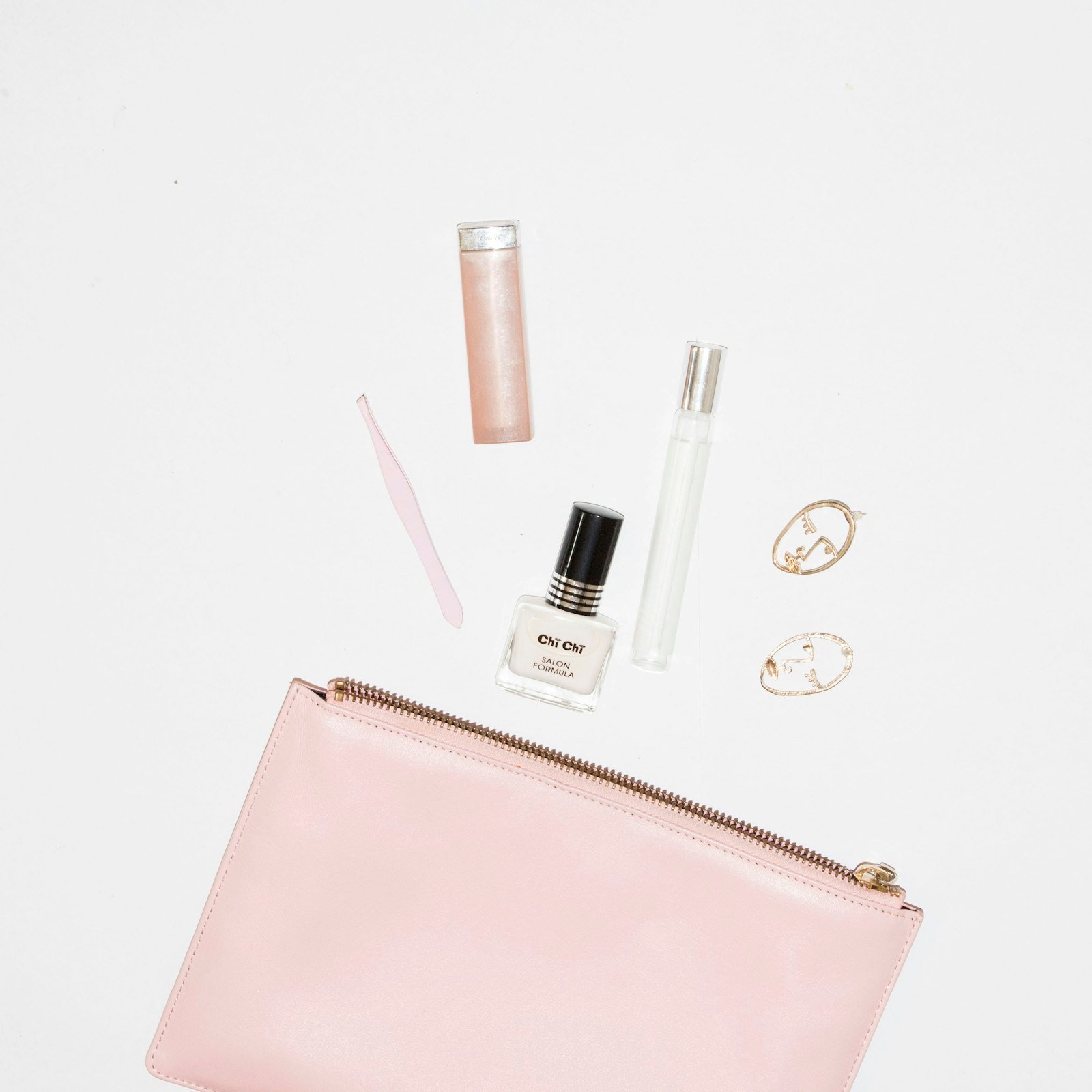 Zip cosmetic pouch with beauty essentials