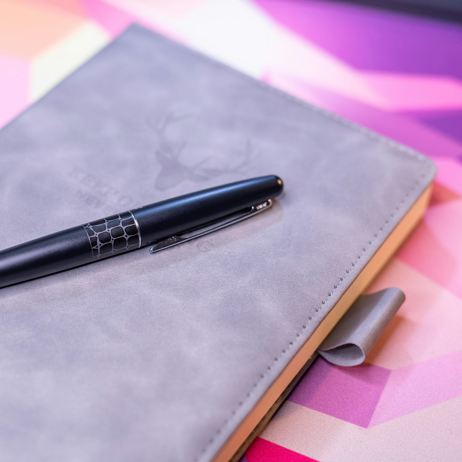 Pen resting on a notebook