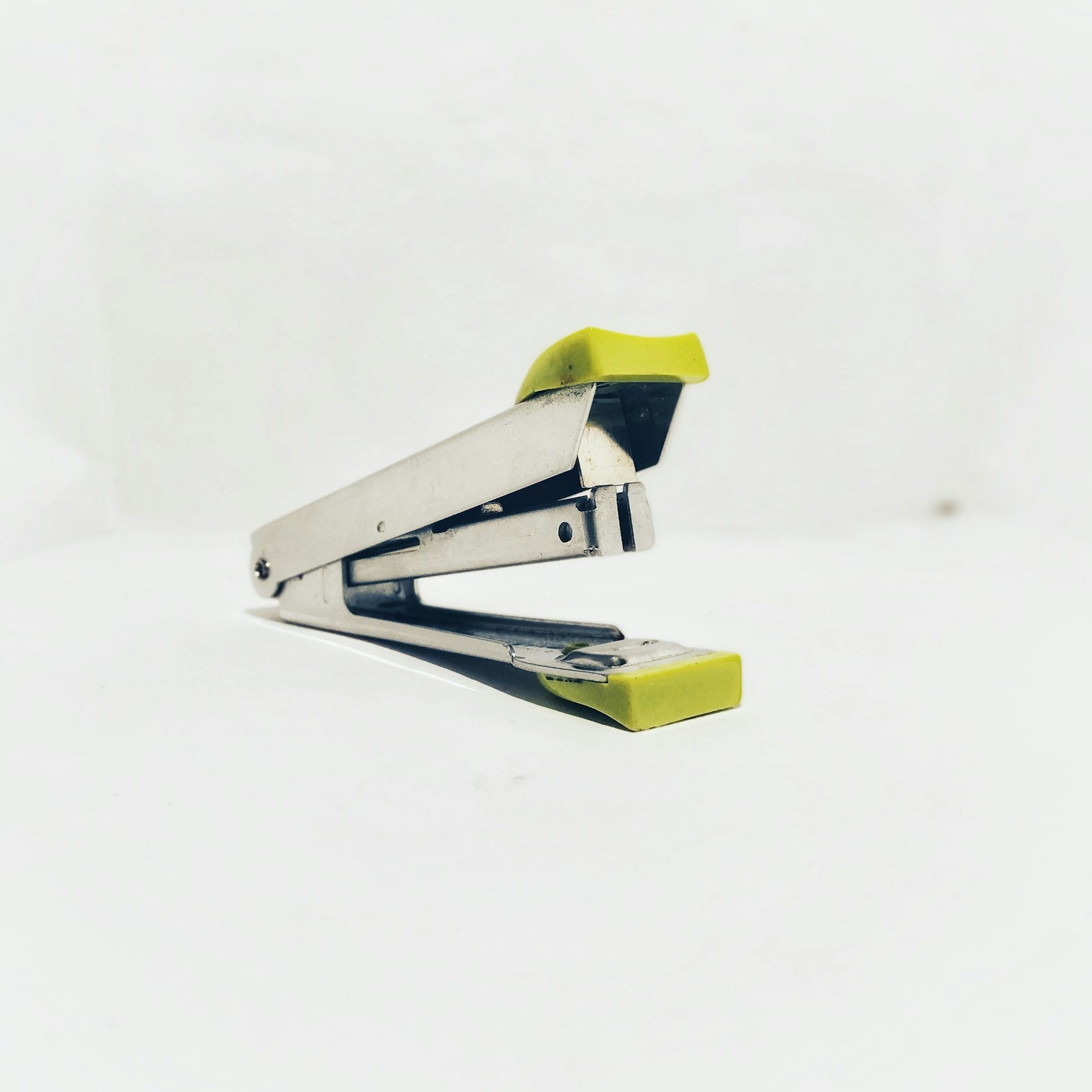 Compact stapler on a white table