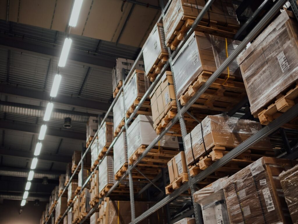Cardboard boxes organized on warehouse shelving