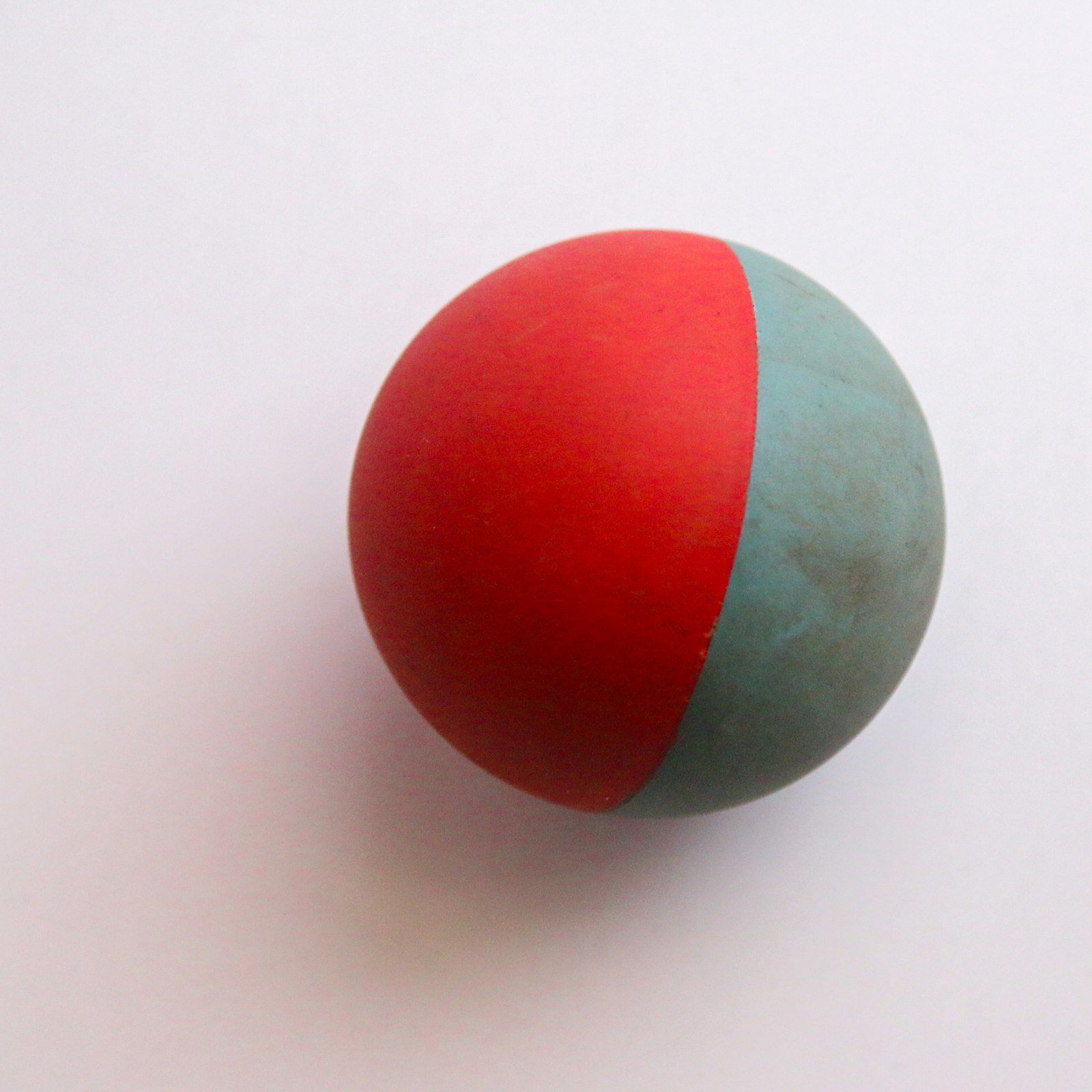 Red and green pet play ball
