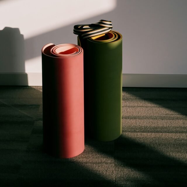 Two rolled exercise mats