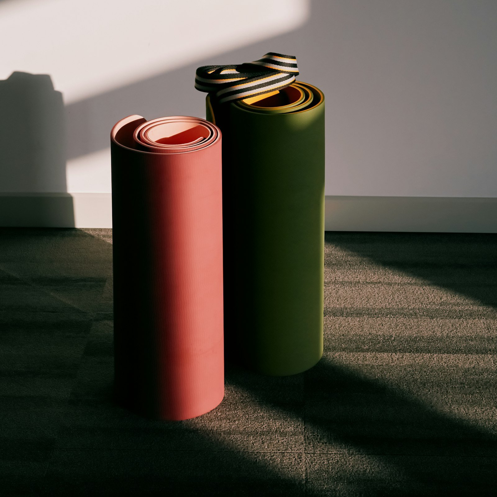 Two rolled exercise mats